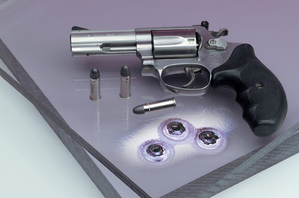 Polycarbonate sheet after a ballistic test. Photo by Plaskolite.