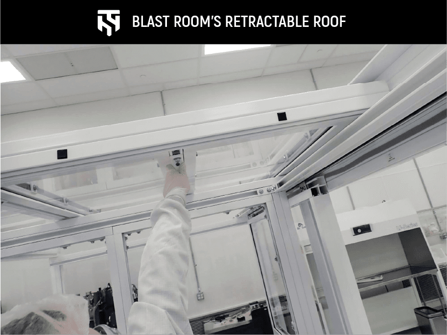 Polycarbonate containment room with a retractable roof, designed and manufactured by TotalShield.