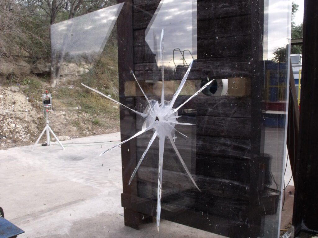 A barrier pierced by a projectile.