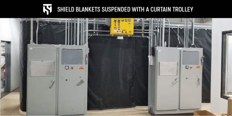 Kevlar shield blanket mounted on a curtain trolley to allow easy movement
